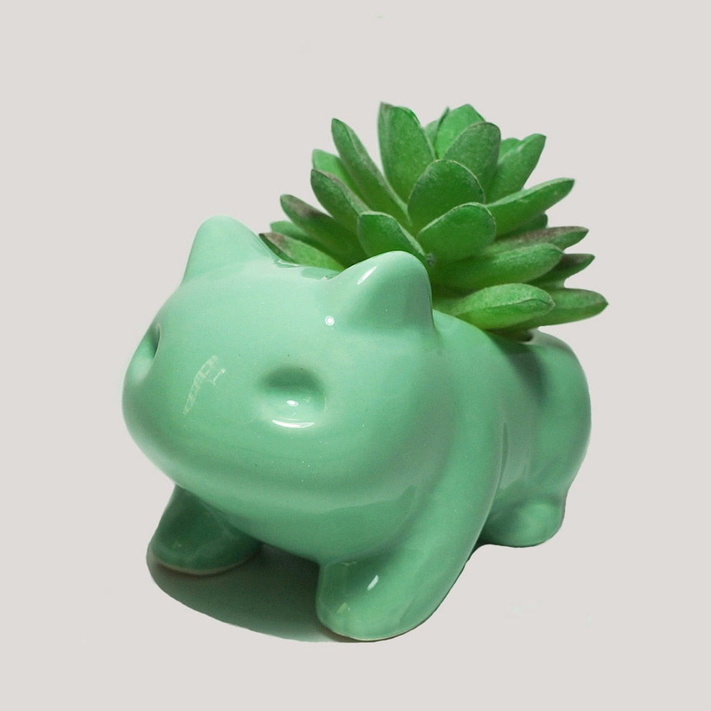 Anime-inspired Clay Cat Sitting on Vase with Green Flowers Stock  Illustration - Illustration of artistic, ceramic: 298904093